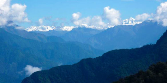 Snow capped peaks as seen from Mayudhia Pass, India
